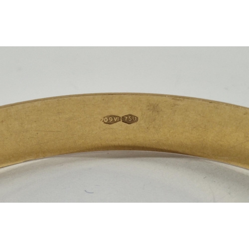 266 - 18ct gold engraved bangle, 13.9g