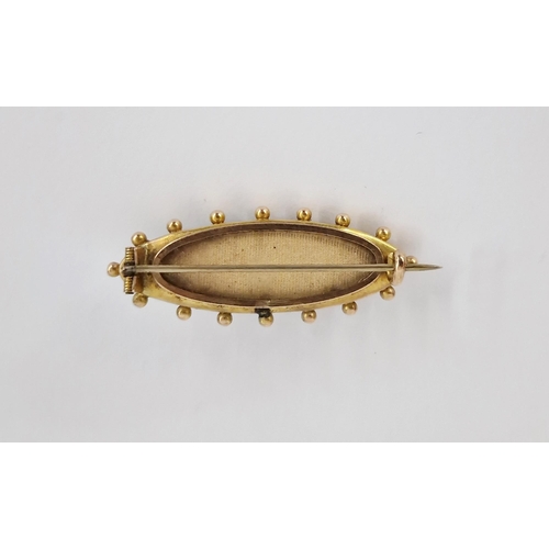 271 - Victorian onyx and seed pearl mourning brooch, elliptical shape with glass locket to reverse.