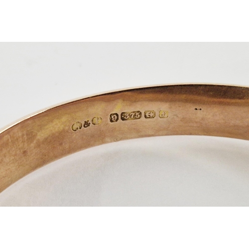 274 - 9ct gold buckle pattern bangle with chased decoration, 1906 11g approx