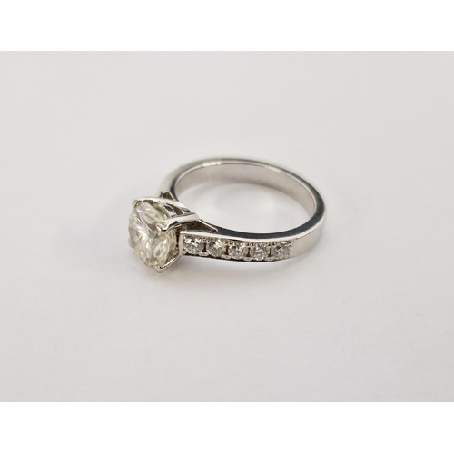 315 - Iliana solitaire diamond ring, the stone approx. 1.2 cts, and having 5 each diamond set shoulders, o... 