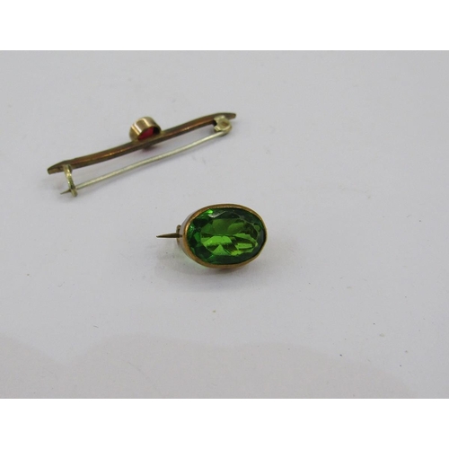 336 - Gold-coloured bar brooch set single faceted red stone, a green stone small brooch, a silver and turq... 