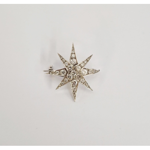 337 - 18ct white gold and diamond star brooch, eight-pointed, marker JHL, 3cm diameter, London 1977