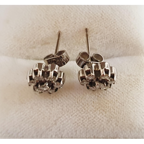 338 - Pair 18ct white gold and diamond cluster earrings