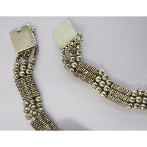 341A - Silver triple-strand choker and matching bracelet with alternating beads and mesh.