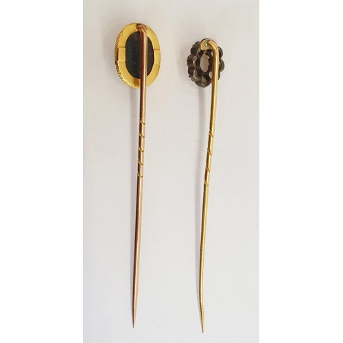 355 - Gold stick pin, the terminal in the form of simulated scarab beetle, and another with opal and diamo... 