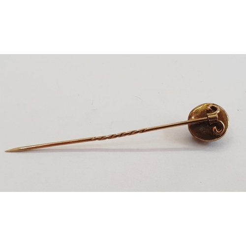 368 - Gold-coloured, cabochon garnet and diamond stickpin set single tiny diamond