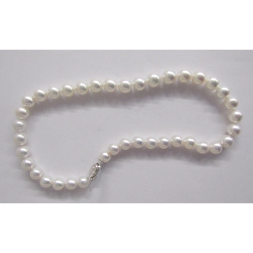 380 - Two long strings of pink, cream and other coloured cultured pearls, a string of coloured cultured pe... 