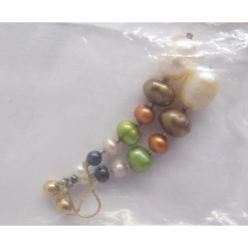 380 - Two long strings of pink, cream and other coloured cultured pearls, a string of coloured cultured pe... 