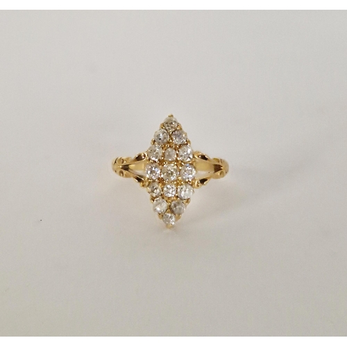 407 - Gold and diamond marquise dress ring, set multiple old cut stones with scrolled shoulders size N1/2