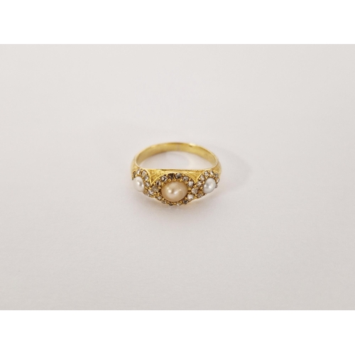 412 - Gold pearl and diamond dress ring, set three pearls surrounded by small old cut diamonds size J