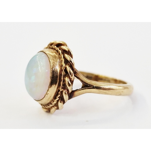 430F - 9ct gold and opal single stone ring, set centre opal stone within ropetwist surround size M, 4.25g g... 