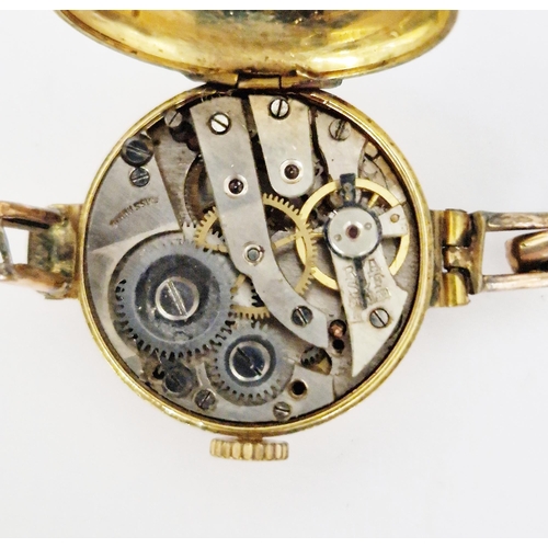 467 - Early 20th century 9ct gold cased ladies wristwatch, the dial having Arabic numerals denoting hours,... 