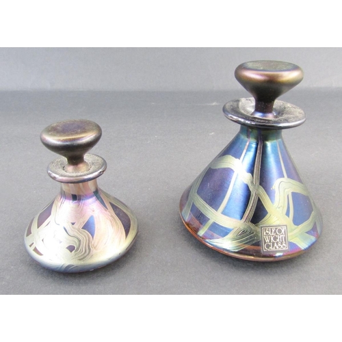 504 - Two Isle of Wight Studio glass perfume bottles, bearing labels, each of tapering conical form decora... 