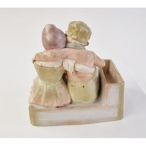 514 - Early 20th century Vienna (Amphora) ceramic figure group of two Dutch children embracing, reading a ... 