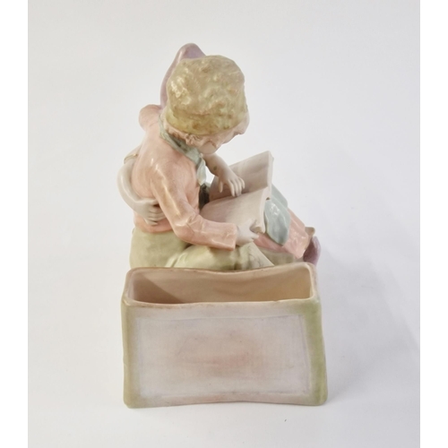 514 - Early 20th century Vienna (Amphora) ceramic figure group of two Dutch children embracing, reading a ... 