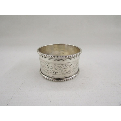 52 - Collection of eight silver napkin rings, of varying designs including pierced, gross weight approxim... 