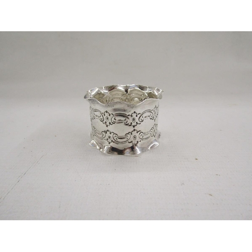 52 - Collection of eight silver napkin rings, of varying designs including pierced, gross weight approxim... 