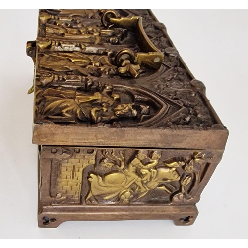 535 - Gothic-style brass casket of rectangular form, stamped 'Dinant', cast with figures beneath trefoil a... 