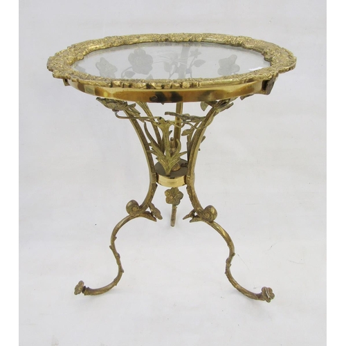 553 - Glass-topped gilt-metal tripod occasional table, French, 20th century, the glass engraved with a sta... 