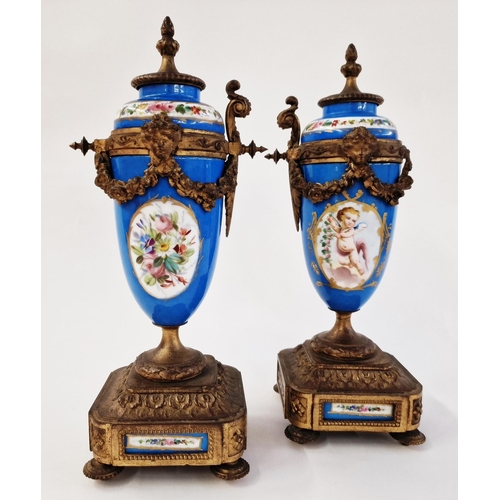 557 - Pair of French Sevres-style gilt metal-mounted porcelain vases with fixed covers, circa 1900, from a... 