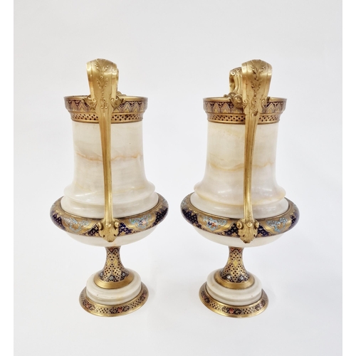 558 - Pair of French gilt-metal, enamel and alabaster mounted two-handled vases, circa 1900, of baluster f... 