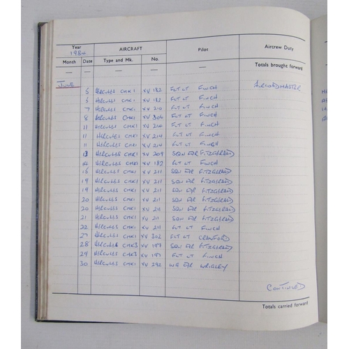 564 - Five Royal Air Force air crew flying log books for R G Hunter from 1960s to 1990s