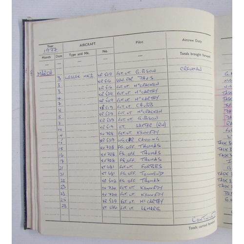 564 - Five Royal Air Force air crew flying log books for R G Hunter from 1960s to 1990s