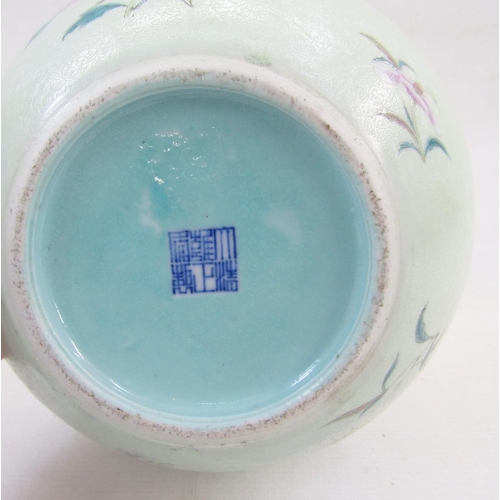 579 - A Chinese porcelain celadon-ground bottle-shaped vase, underglaze blue apocryphal Yongzheng seal mar... 