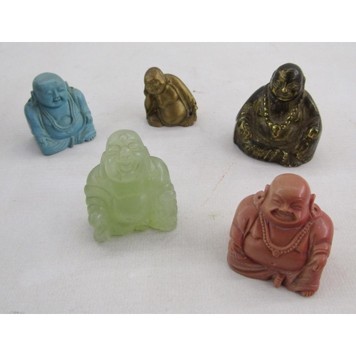 589 - Collection of coloured hardstone and similar precious stone models of Buddhas, including turquoise, ... 