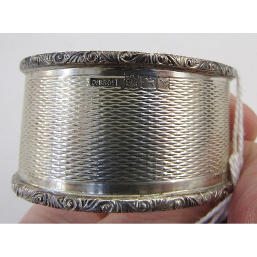 7 - 20th century silver napkin ring, oval form with engine turned decoration, hallmarked Birmingham 1973... 