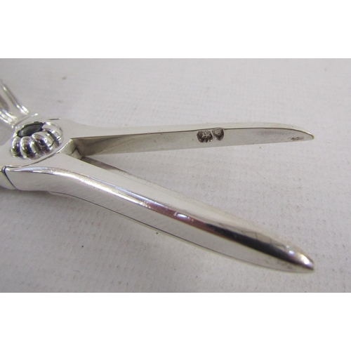 70 - Pair of George IV silver grape scissors, hallmarked London 1827, by WE, 17cm long, 65.4/2.1ozt