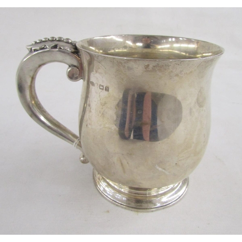 72 - George V silver baluster mug by Asprey & Co, with leaf finial to the handle, engraved initial to fro... 