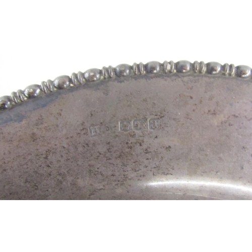 90 - George V silver comport, circular with bead and bar edge, on waisted column on circular foot  26cm d... 