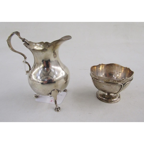 96 - Small silver sugar bowl with serpentine edge, panelled body on circular foot 6 diam x 5 cm h , Londo... 