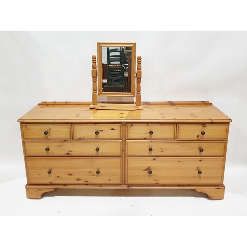 1048 - Modern pine low dresser by Ducal, comprising four short and four long drawers, each with metal handl... 