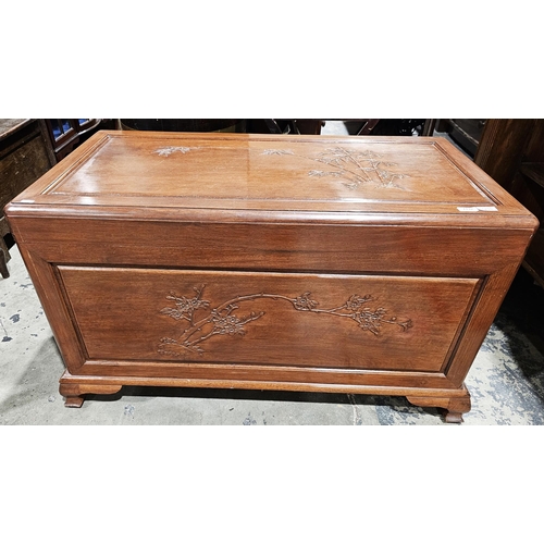 1132 - 20th century carved camphorwood travelling trunk/blanket box having carved bamboo motifs to front, t... 