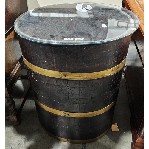 1133 - Antique coopered barrel adapted into a glass-topped occasional table of oval form, 70cm high x 56cm ... 