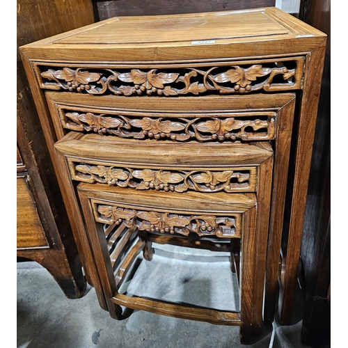 1137 - 20th century Asian hardwood carved nest of three occasional tables, each fan-shaped with pierced fol... 