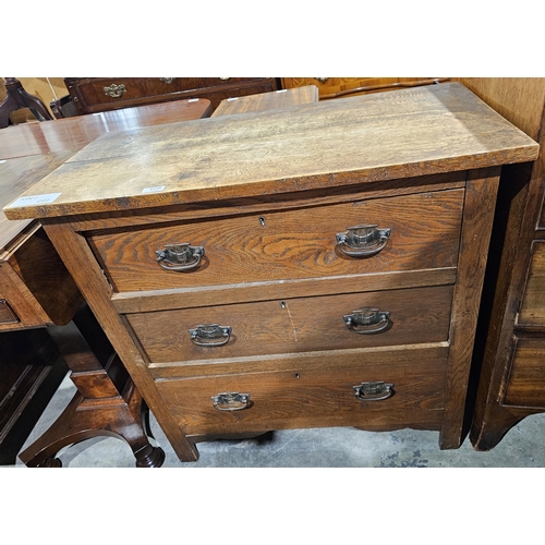 1139 - Late 19th century oak Arts and Crafts chest of drawers, with three long graduating drawers and coppe... 