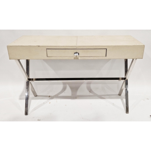 1155 - Modern cream faux leather covered desk with single drawer to the front, raised on chrome X-frame leg... 