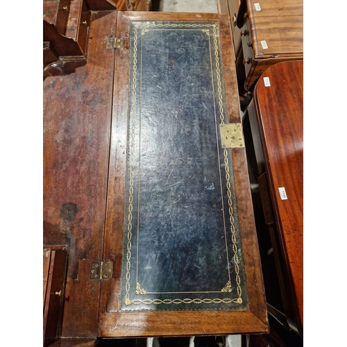 1162 - Georgian mahogany bureau, the fall front opening to reveal a blue gilt leather inset top and an asso... 