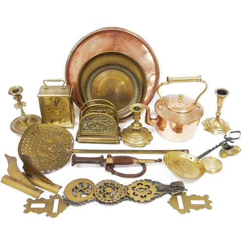 135 - Assorted brass and copper including a Victorian kettle, a brass toast rack, a circular copper tray, ... 