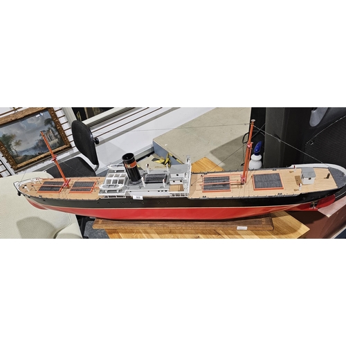 163 - Early to mid 20th century model of a tramp ship steamer, named 'Darwin', with red painted hull, on w... 