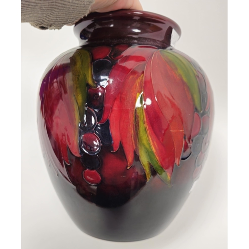 45 - Moorcroft 'Leaf and Berry' pattern oviform vase, 20th century, painted and impressed marks, tube lin... 