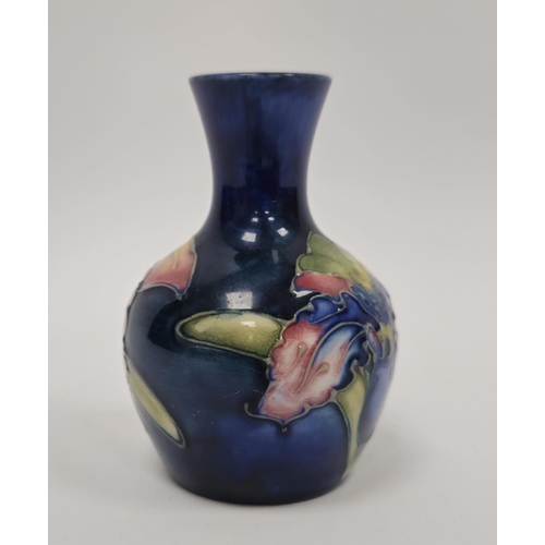 45A - Small Moorcroft iris pattern flower vase, 20th century, applied with Moorcroft Potter to the Late Qu... 