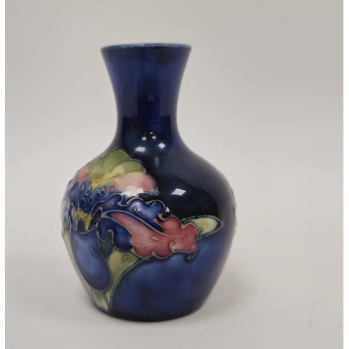 45A - Small Moorcroft iris pattern flower vase, 20th century, applied with Moorcroft Potter to the Late Qu... 