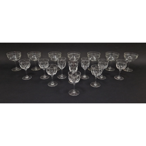 59 - Art Deco part table service comprising seven ribbed champagnes coupes, a Stuart cut glass table serv... 