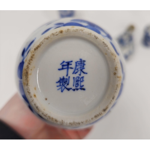 79 - Collection of Chinese porcelain blue and white small vases, variously painted in the Kangxi-style, p... 