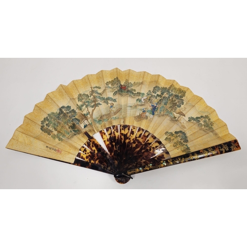 80 - Japanese tortoiseshell painted paper fan, the guards inlaid with gilt metal and mother-of-pearl, cor... 