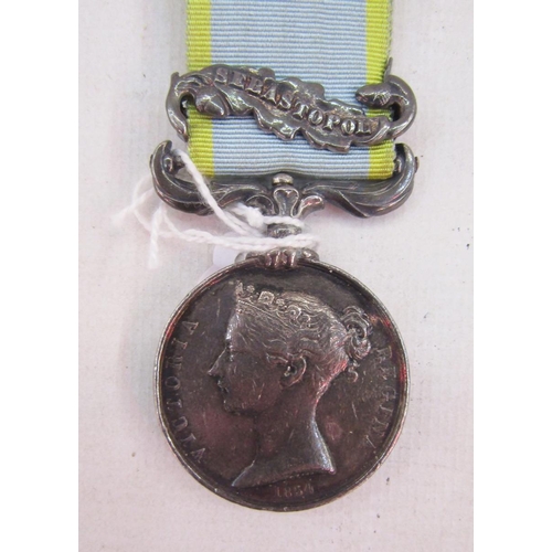 106 - Victorian Crimea medal with Sebastopol clasp, named to 'No 2139 James Cock 17th Regt'.